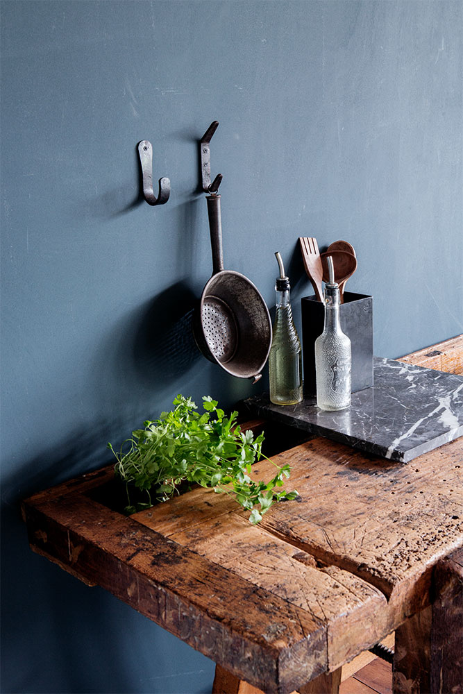 campaign photography Brut Amsterdam color blue wall hooks kitchen by Poppyonto