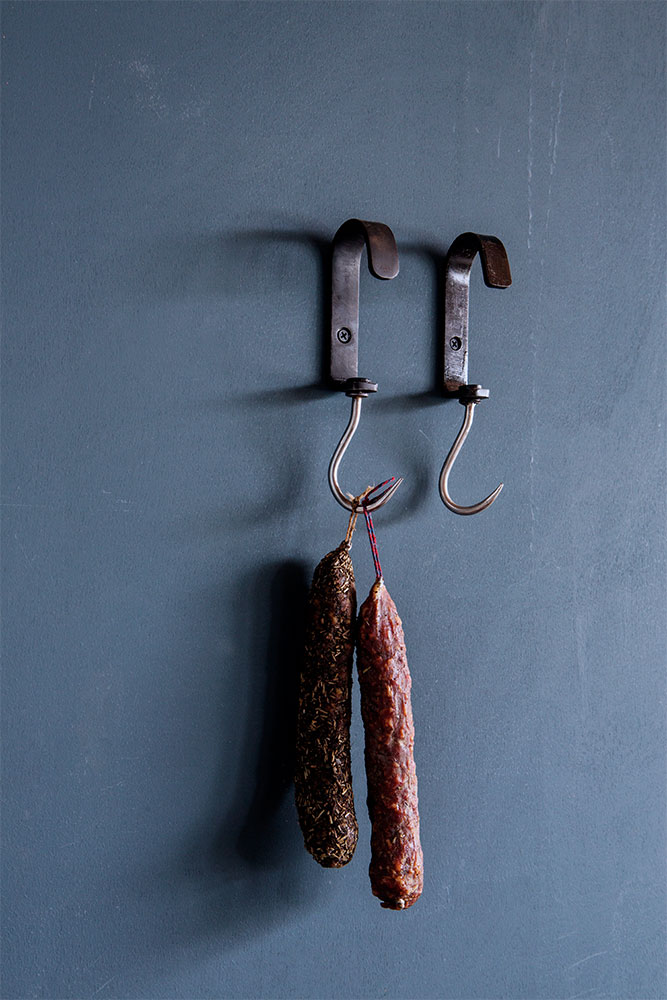campaign photography Brut Amsterdam color blue wall hooks kitchen by Poppyonto